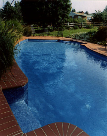 In ground pool with stairs